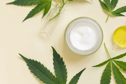Homemade Organic Hemp Seed Lotion in glass jar with hemp leaves