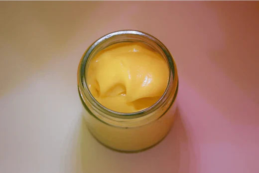 homemade Go Native NZ recipe Vitamin C & summer fruits yellow cream flipped in jar with peach coloured glow