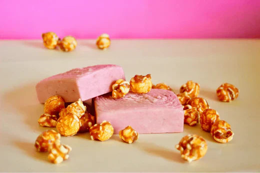 Go Native Nz recipe two Caramel Popcorn Shampoo Bars with scattered popcorn