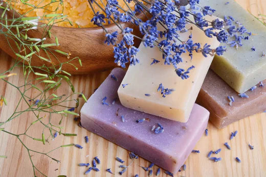 Homemade Lavender Cold-Process Soap, with lavender flowers and other soaps