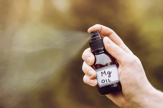 home made magnesium spray in bottle being sprayed