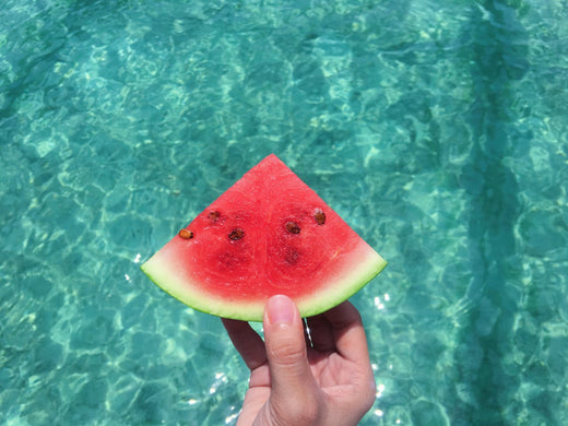 Skincare Vitamin Water hand holding Watermelon 