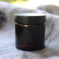 Amber glass pot - black lid: 50ml