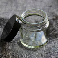 Clear glass pot - black lid: 50ml