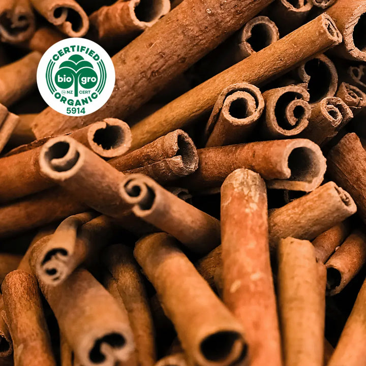 Go Native NZ coils of red brown Ciinamon bark Essential Oil with Bio Gro Icon verifying Certified Organic status